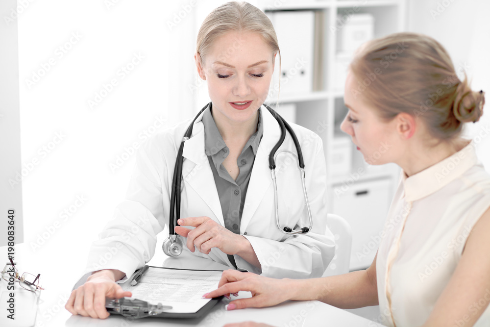 Doctor and patient during personal consulting in hospital Doctor and patient during personal consulting in hospital