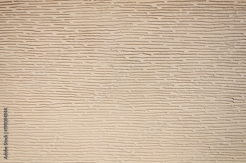 Close up of paint covering stucco wall