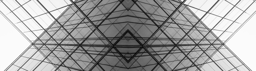 architecture of geometry at glass window - monochrome