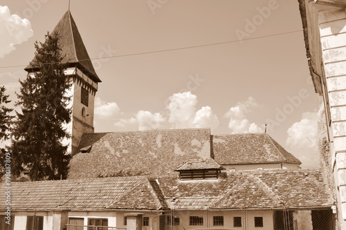 Fortified medieval saxon evangelic church  in Agnita- Agnetheln, mentioned for the first time in a Saxon document from 1280, a town with a craft tradition photo