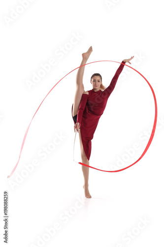 Sport gymnastic girl with a ribbon