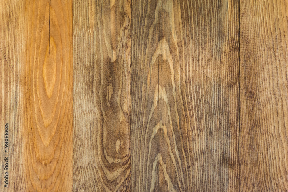 Obraz premium Brown wooden board with a pattern background texture, a wooden floor, a fence of natural wood, a surface of a teak wood background for design and decoration