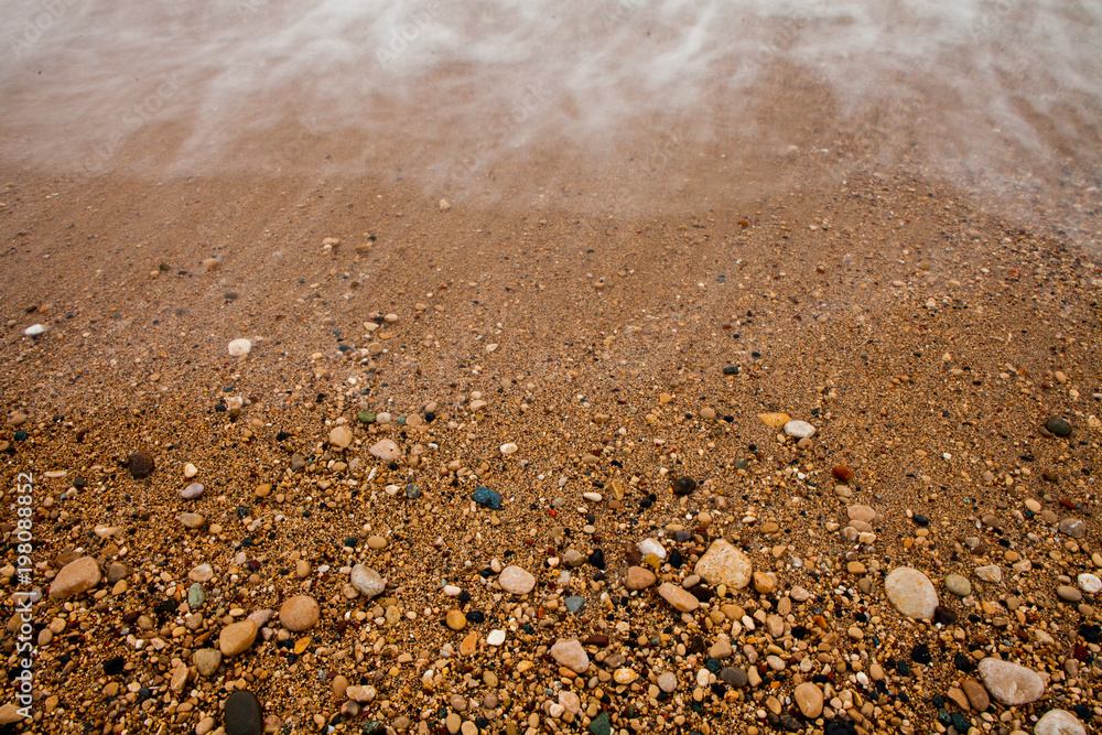 Sea background of sand. Textural background from sea small gravel, for your design. Sea background of sand. Textural background from sea small gravel, for your design.
