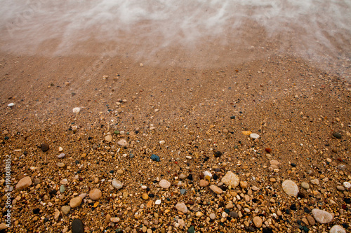 Wallpaper Mural Sea background of sand. Textural background from sea small gravel, for your design. Torontodigital.ca
