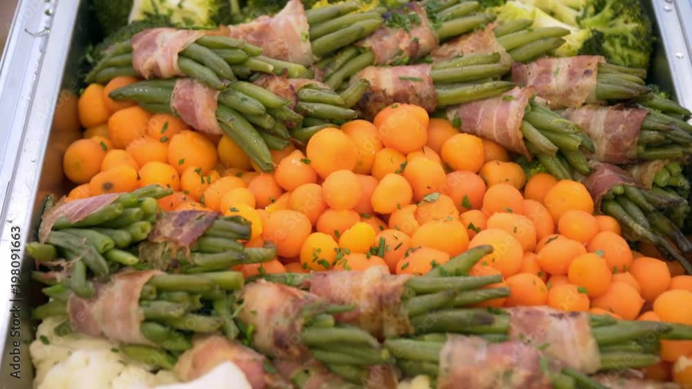 People group catering buffet food indoor in luxury restaurant with meat colorful fruits and. People group catering buffet food indoor in luxury restaurant with meat colorful fruits and.
