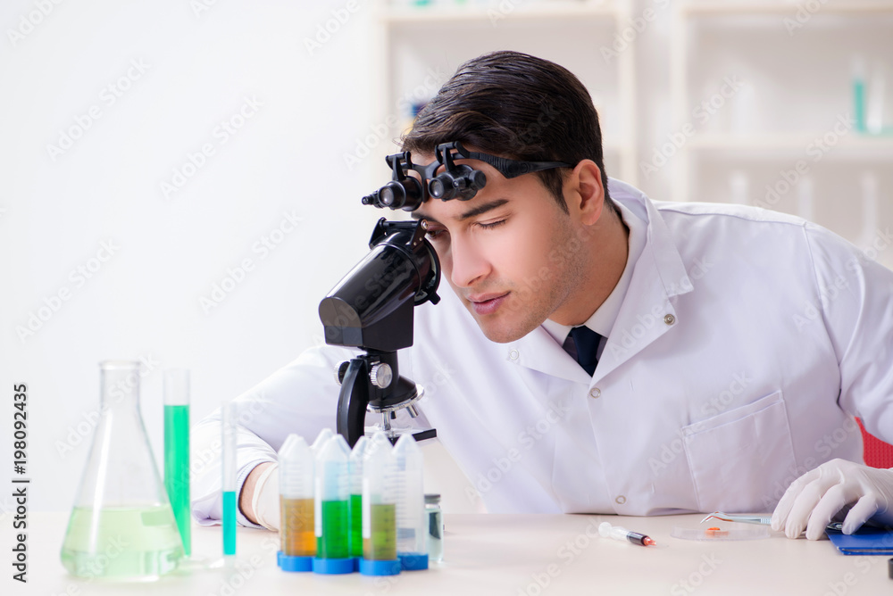 Young chemical scientist working in lab Young chemical scientist working in lab