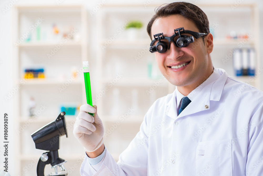Chemist working on cannabis extract for medical purposes Chemist working on cannabis extract for medical purposes