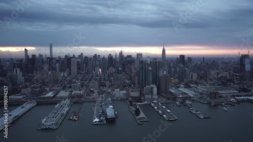 New York City wide angle aerial view of Midtown Manhattan skyline from Pier 84 and the Hudson River. photo