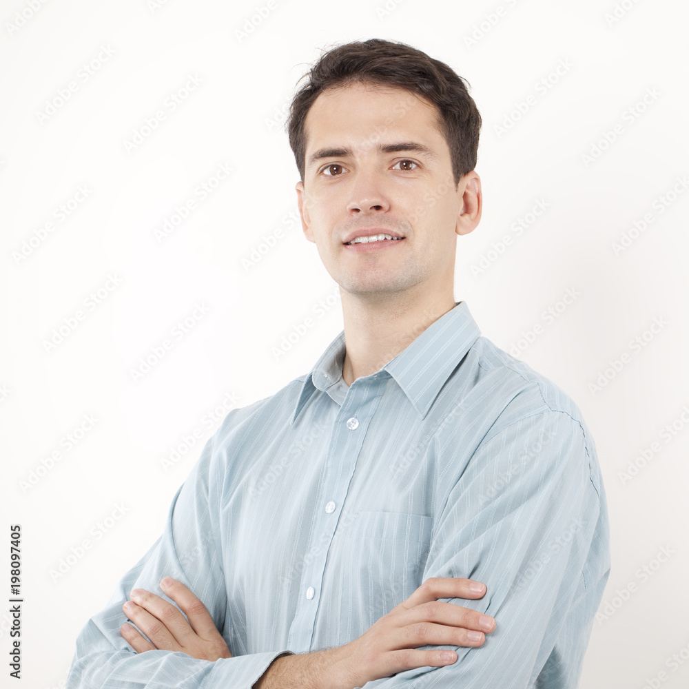 Smiling businessman crossing his hands Smiling businessman crossing his hands