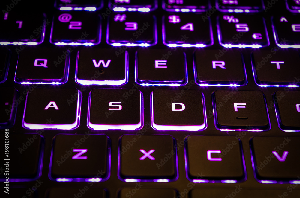 Purple keyboard backlight of gaming computer