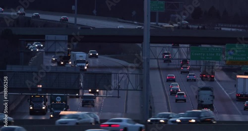 Stacked highway traffic just after sunset photo