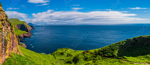 Panoramic view of Mykines at Faroe islands and North Atlantic pu