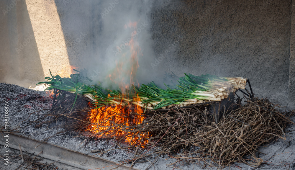 Traditional catalan calsots in the fire Traditional catalan calsots in the fire