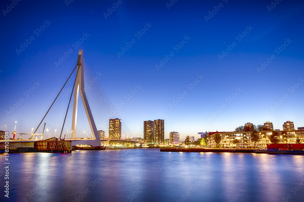 Travel Concepts. View of Unique and Beautiful Erasmus Bridge in Rotterdam. Shot During Blue Hour.