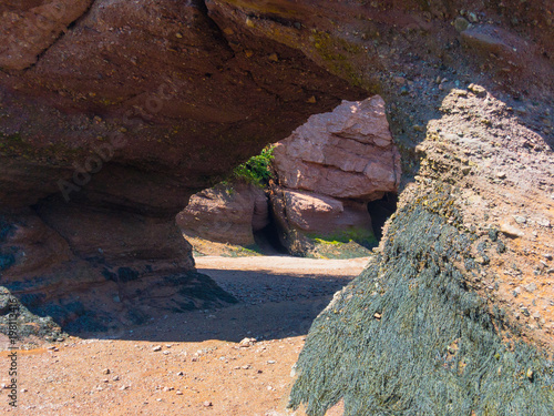 Arches under the Flowerpot rocks due to erosion caused by the tides on the Bay of Fundy