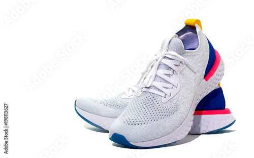 White sport shoes on isolated white background with copy text space