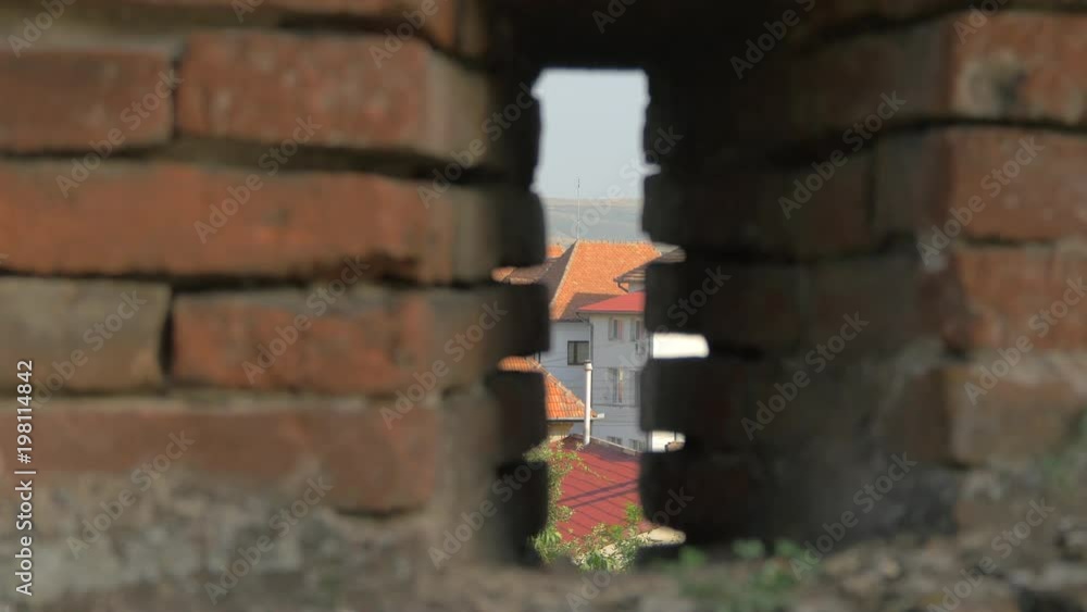 Buildings seen through the bricks Buildings seen through the bricks
