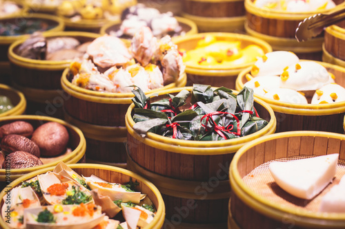Assortment of different types of asian traditional street food in Shanghai, China © tsuguliev