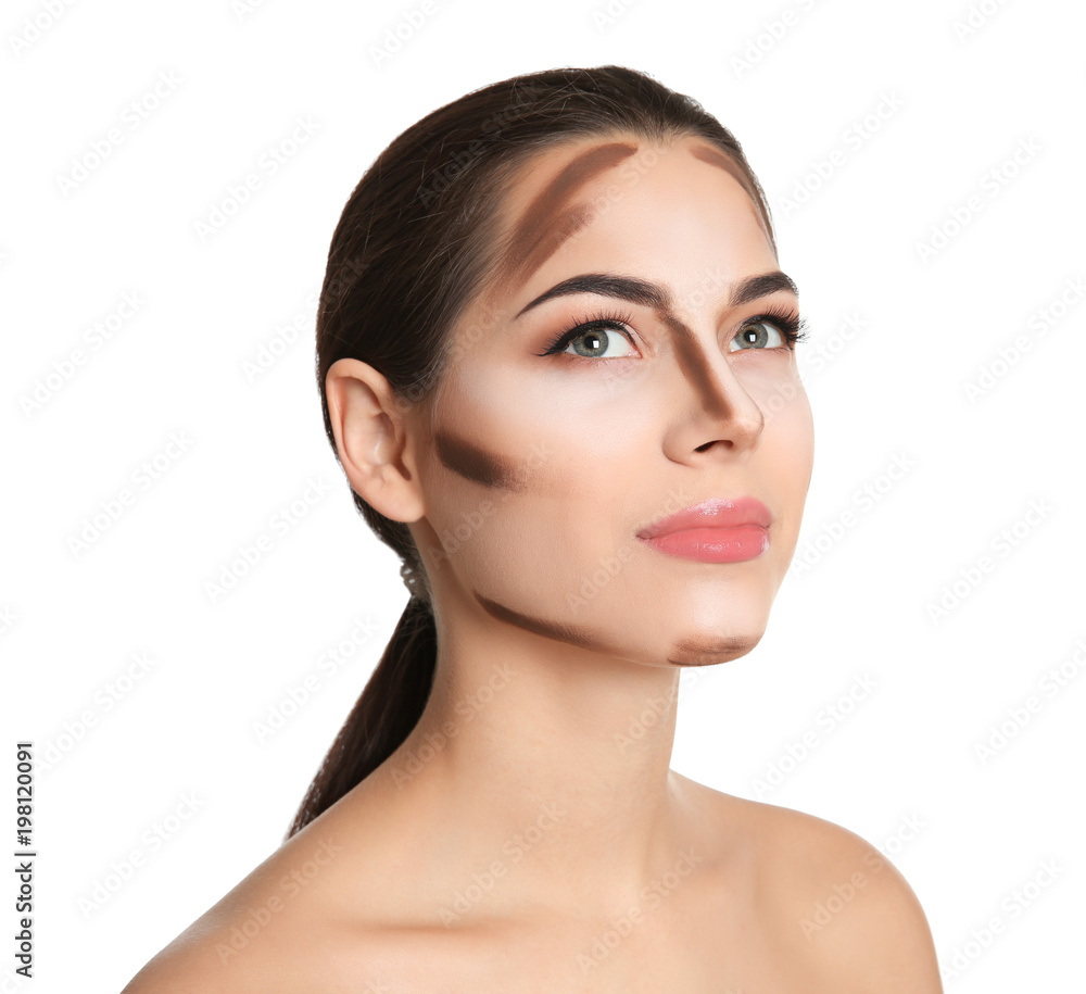 Fototapeta premium Young woman with contouring lines on her face against white background. Professional makeup products