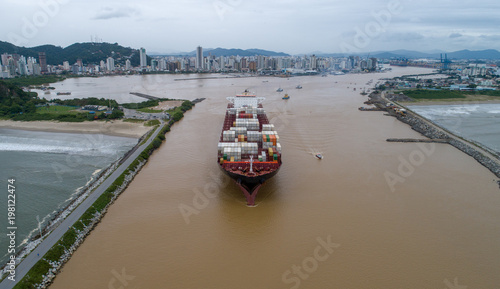 Large Ship Leaves City Behind