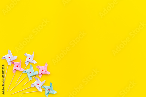 Birthday party background. Decoration on yellow top view mockup