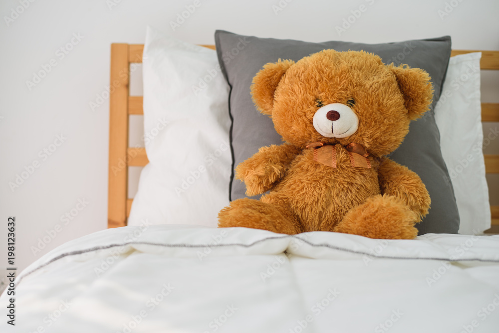 Teddy bear on the bed