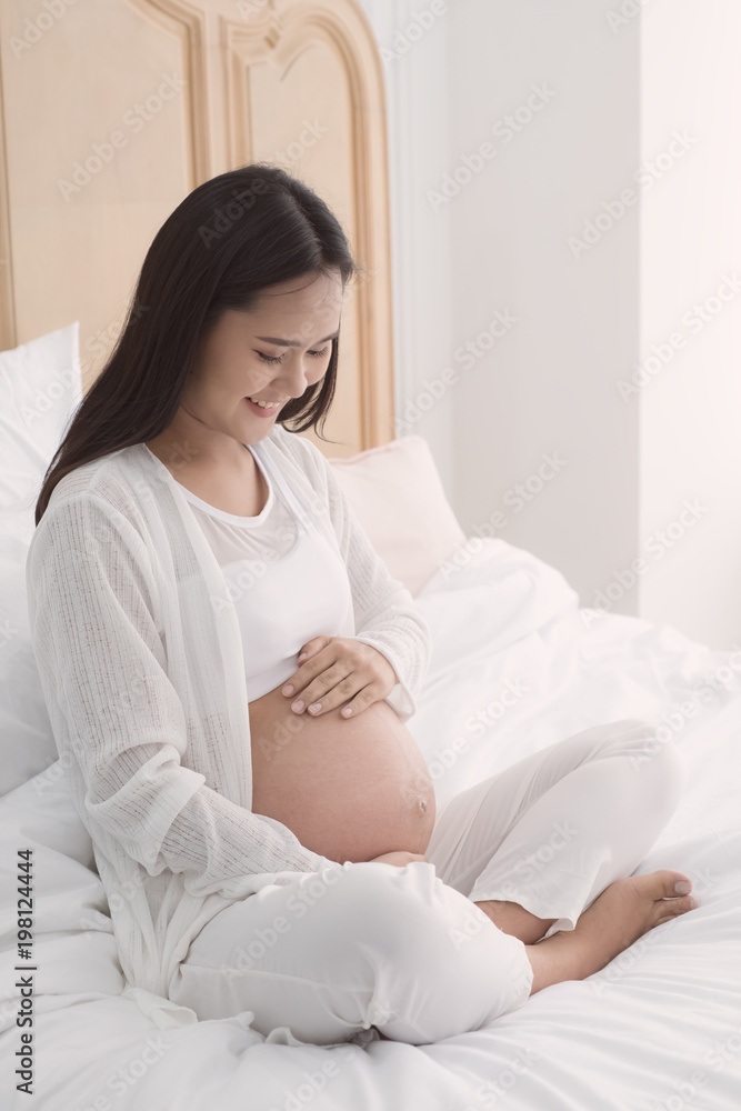 pregnant woman touch her belly pregnant woman touch her belly