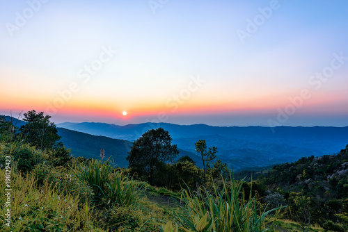 Phu Chi Fah in Chiang Rai,Thailand at sunset.Phu Chi Fah, is a mountain area and national forest park. it is one of the famous tourist attractions of the Thai highlands near Chiang Rai.