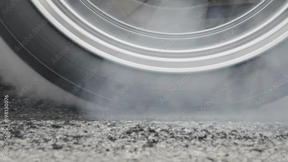 Drag racing car burn tire at start line Drag racing car burn tire at start line