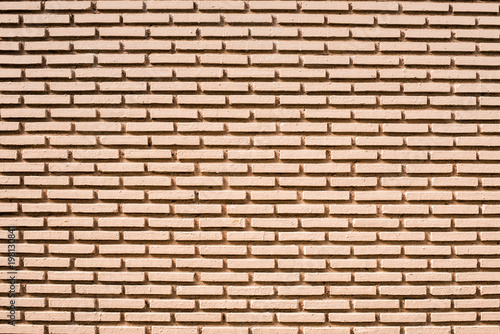 Pattern brick wall orange color background for text and design. urban and loft style.