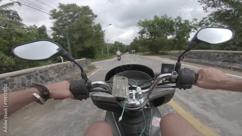 Bike street first person view scooter asia thailand urban city and jungle ride photo