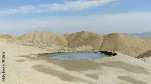 Crater of mud volcano, gurgling mud, eruption