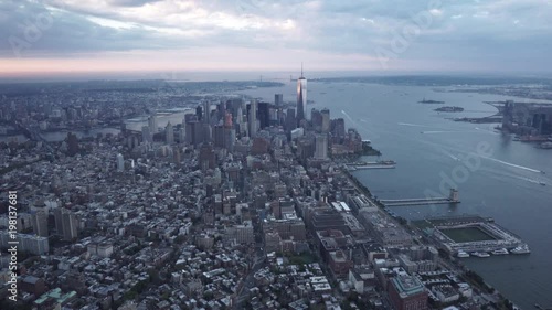 New York City wide angle aerial view flying toward Lower Manhattan from Chelsea.