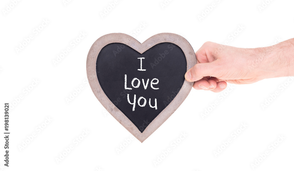 Adult holding heart shaped chalkboard Adult holding heart shaped chalkboard