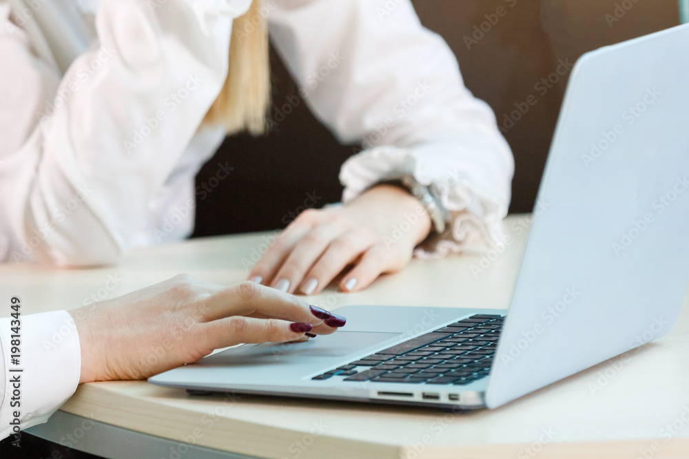 Image of a pretty young lady working in office Image of a pretty young lady working in office