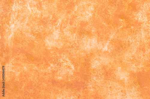 Abstract orange background. The surface of concrete or metal.