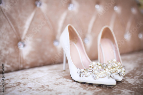Foto Elegant and stylish bridal shoes. Selective focus.