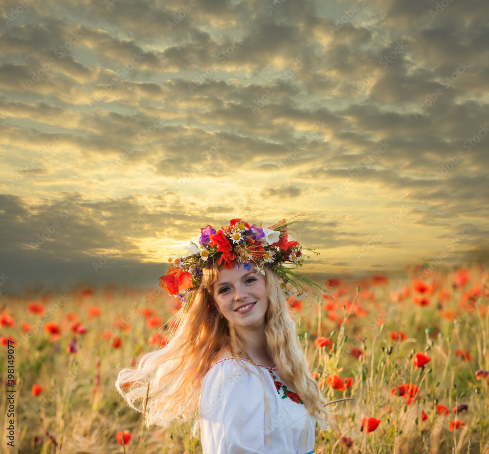 Girl in a poppy field