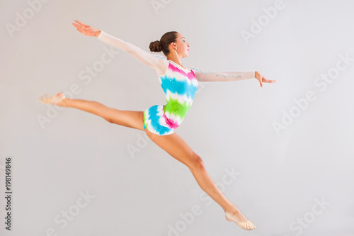 Fototapeta Naklejka Na Ścianę i Meble -  Gymnast is jumping
