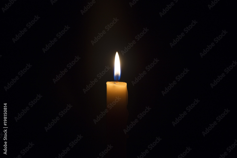 Candle flame closeup isolated on black. Abstract Background. Candle flame closeup isolated on black. Abstract Background.