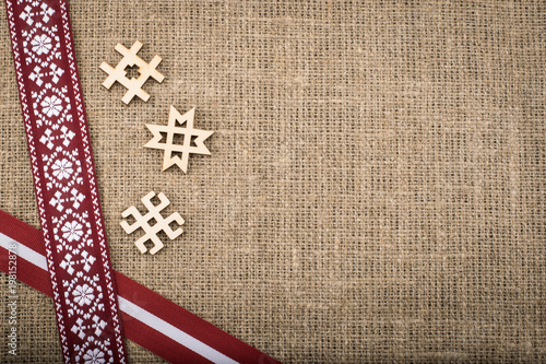 Composition of national latvian patterned ribbons and signs photo