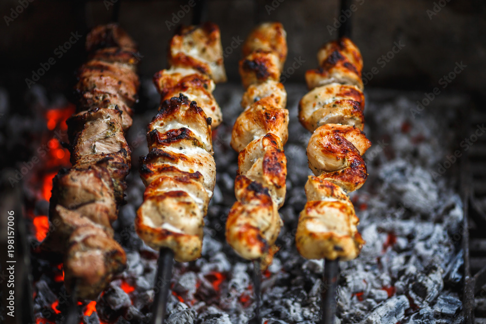 hot yummy barbecue, shashlik, kebab, skewer on the grill hot yummy barbecue, shashlik, kebab, skewer on the grill
