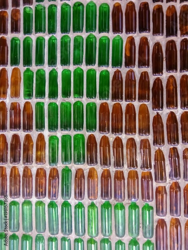 Wall made of colorful bottles.