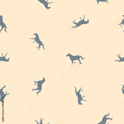 Seamless pattern small gray horses on yellow, pastel colors © dmf87