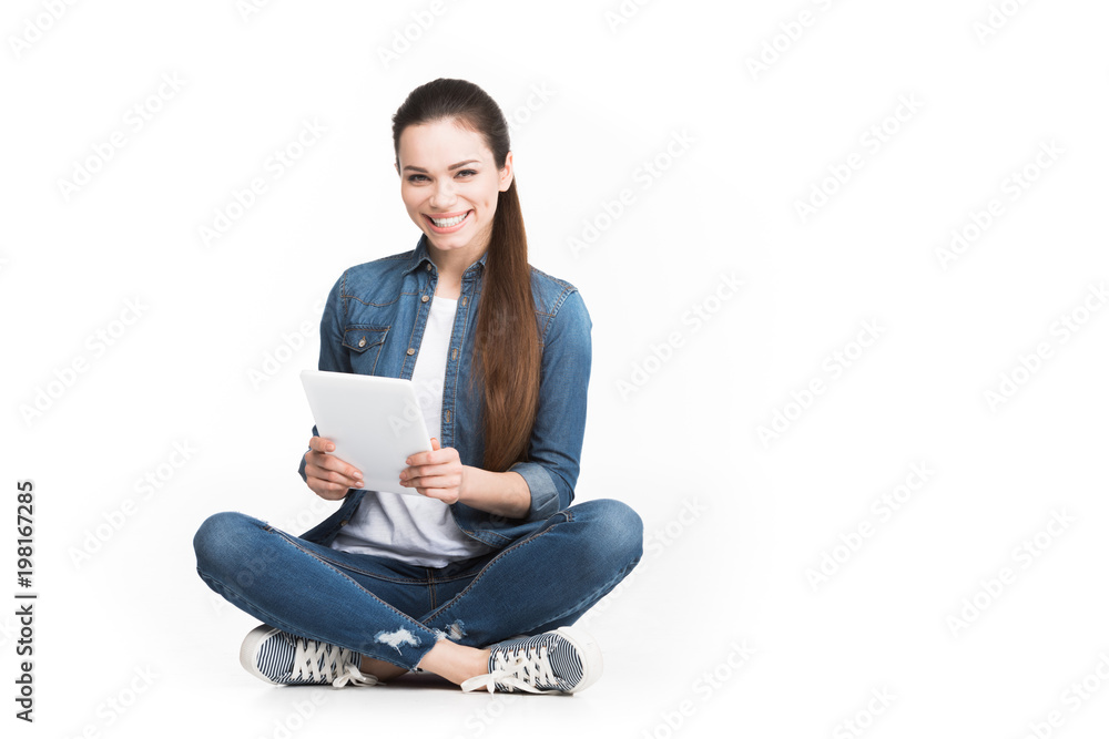 beautiful cheerful girl using tablet, isolated on white beautiful cheerful girl using tablet, isolated on white