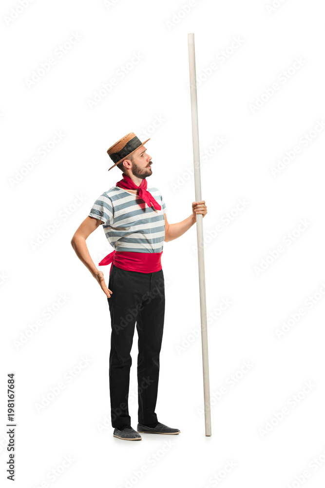 Caucasian man in traditional gondolier costume and hat Caucasian man in traditional gondolier costume and hat