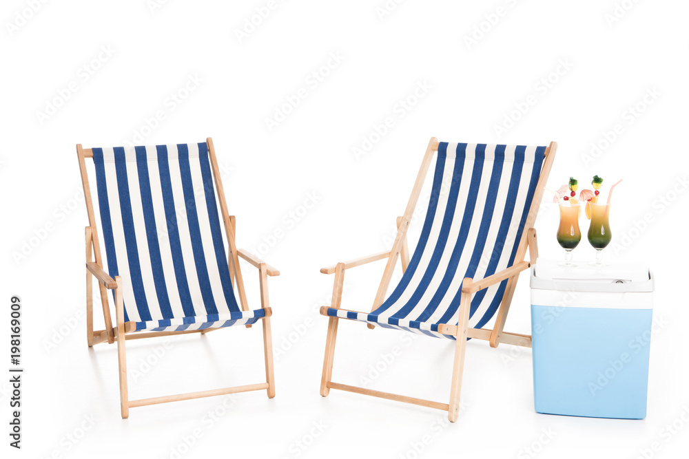 beach chairs, cooler box and summer cocktails, isolated on white