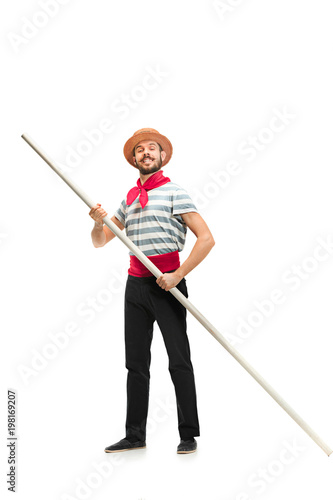 Leinwand Poster Caucasian man in traditional gondolier costume and hat