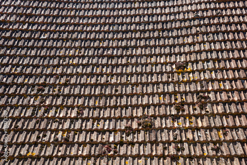 A large expanse of rustic French roof tiles, full frame construction background texture © Chris Rose