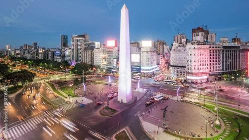 Buenos Aires, Argentina, time lapse view of traffic around the Obelisk of Buenos Aires and 9 de Julio Ave, the widest avenue in the world. photo